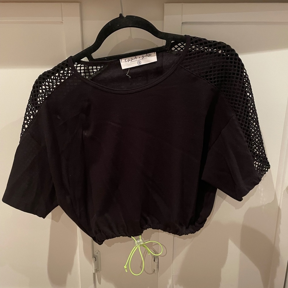 Black top with mesh and green detail. LF!